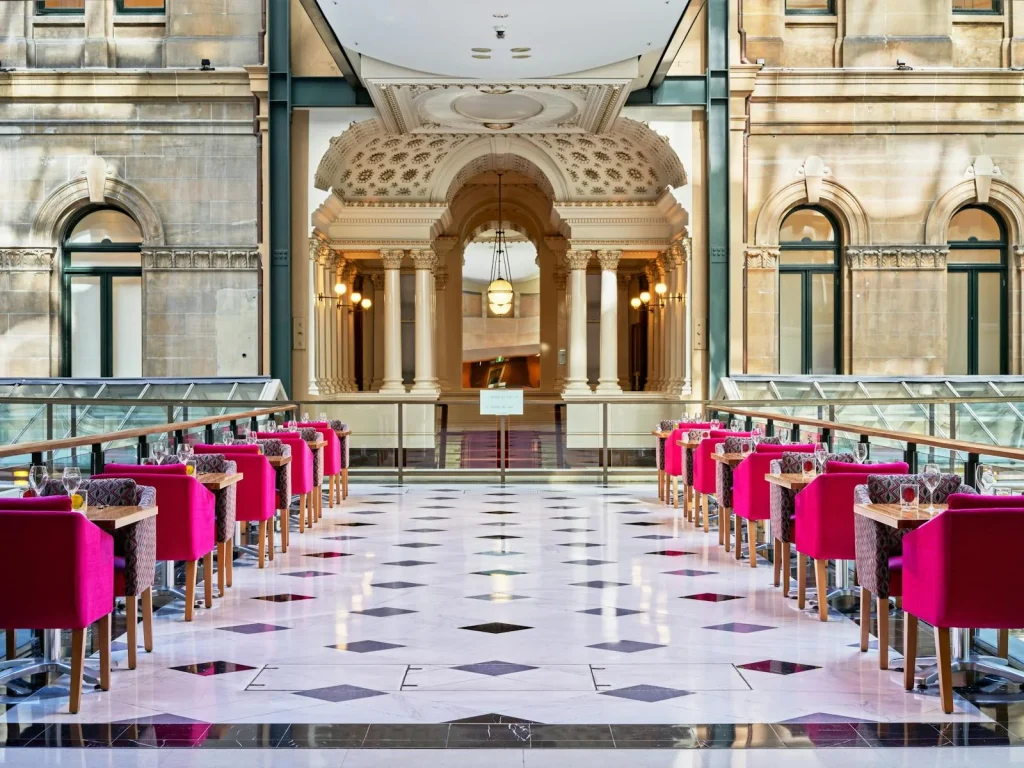 The grand and accessible interior of The Fullerton Hotel Sydney, a historic hotel ideal for accessible travel in Sydney.