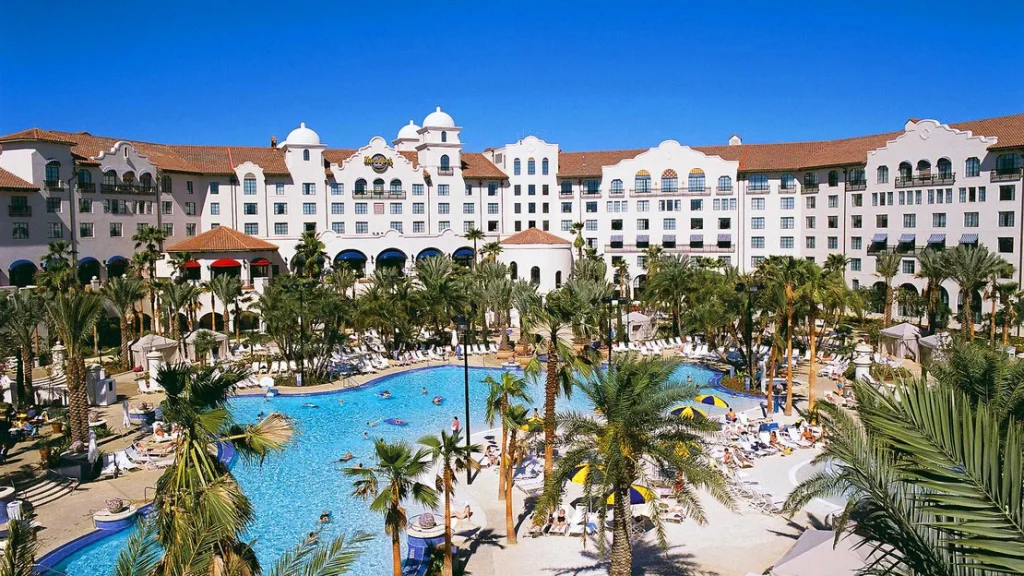 The iconic Hard Rock Hotel at Universal Orlando with its large pool, a popular choice for accessible travel in Orlando.