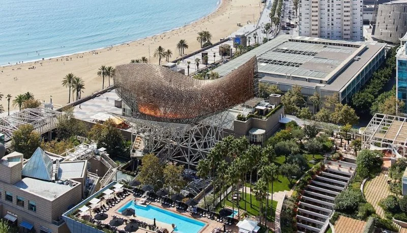 Aerial view of the luxurious Hotel Arts Barcelona and its grounds, a top accessible hotel for accessible travel in Barcelona.