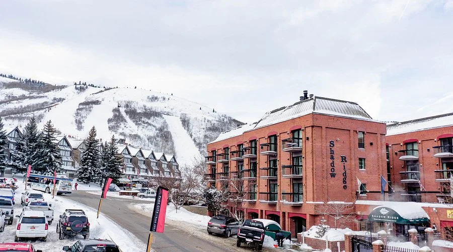 The exterior of Shadow ridge resort, located near snowy slopes, offering accommodation for accessible winter travel holidays.